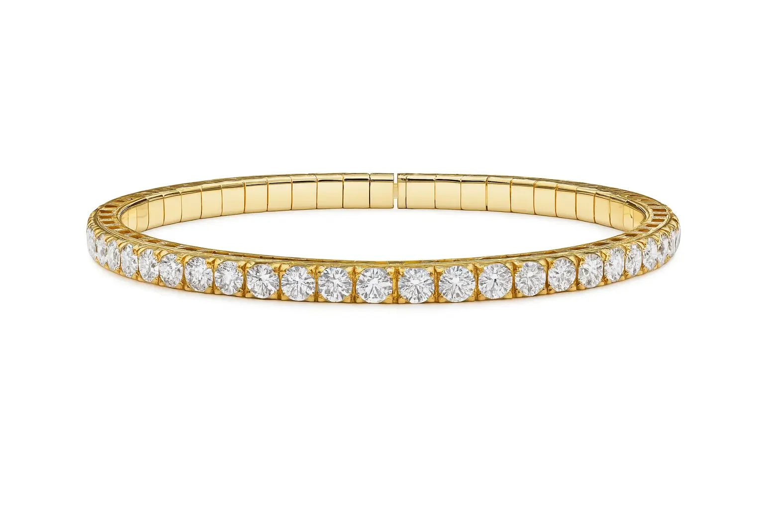 Gold diamond tennis bracelet with round cut stones and stretchable design on white background