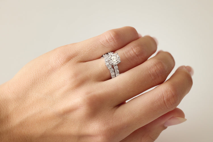 Natural diamond engagement ring and band on hand – Picasso Gold & Diamond Chicago