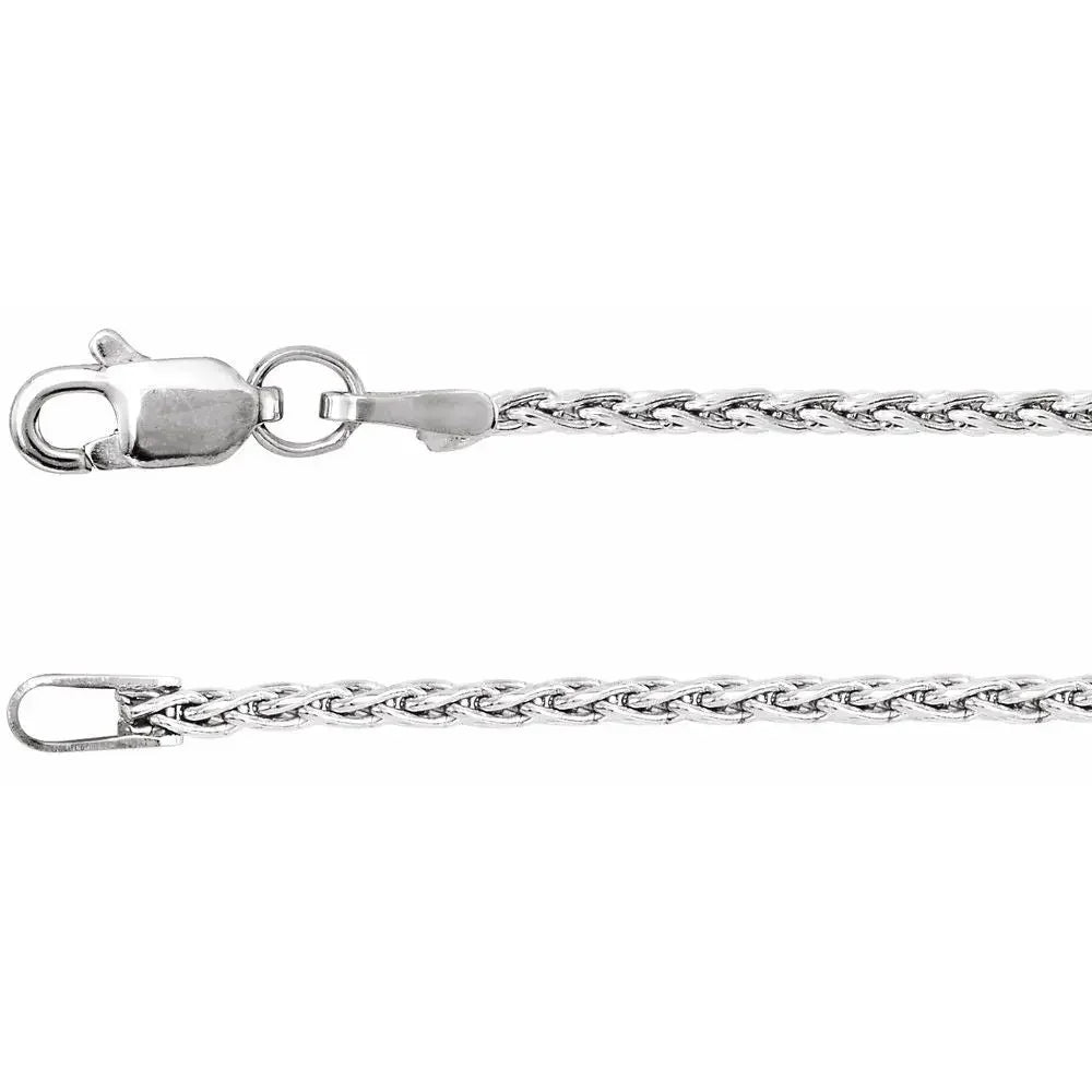 White gold braided chain necklace with lobster clasp, close-up jewelry detail.