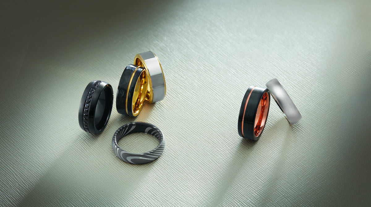 Men's tungsten and black wedding bands with gold and rose gold inlays – Picasso Gold & Diamond Chicago