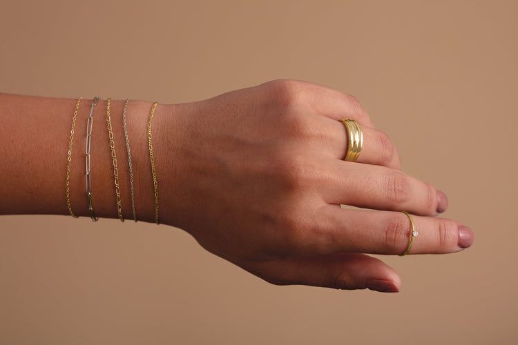 Gold chain bracelets worn on wrist – Picasso Gold & Diamond Chicago