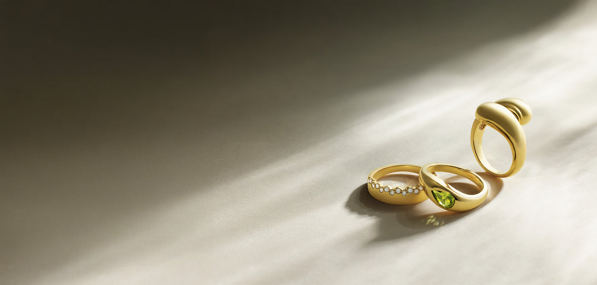 Sculptural 14K gold rings in raking light – Picasso Gold & Diamond Chicago