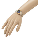 Certified pre-owned Rolex Datejust 26mm blue dial watch, bezel detail view.