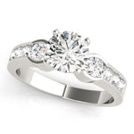 Round Lab Grown Diamond Three-Stone Engagement Ring in 14K gold and platinum