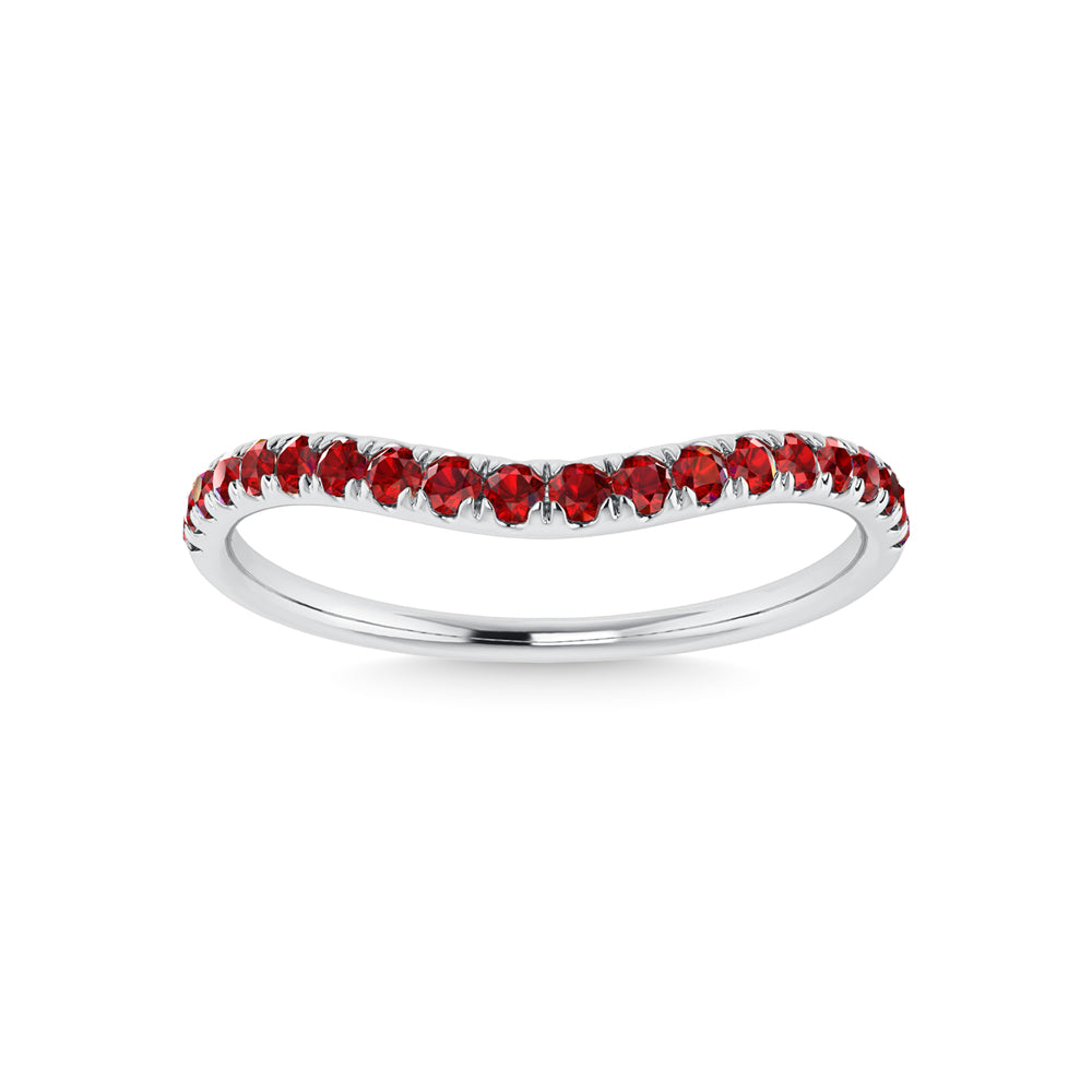 Curved diamond band in 14k White Gold, featuring 0.2 CTW ruby, in a round cut, close-up detail shot | Picasso Gold & Diamond Jewelry.