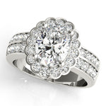 Oval Lab Grown Diamond Halo Engagement Ring in 14K gold and platinum