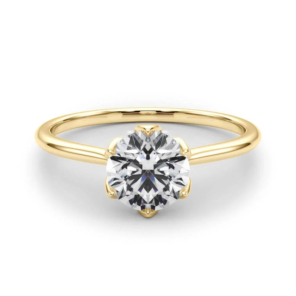 Yellow gold solitaire engagement ring with round diamond, classic four-prong setting