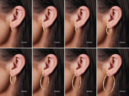 Choosing a wider huggie earring makes a bolder statement and is more noticeable, while choosing a narrower earring is more subtle and understated.