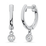Hoop earrings in 10k White Gold, set with 1/2 Ct.Tw. lab-grown diamond, in a round cut, close-up detail shot.