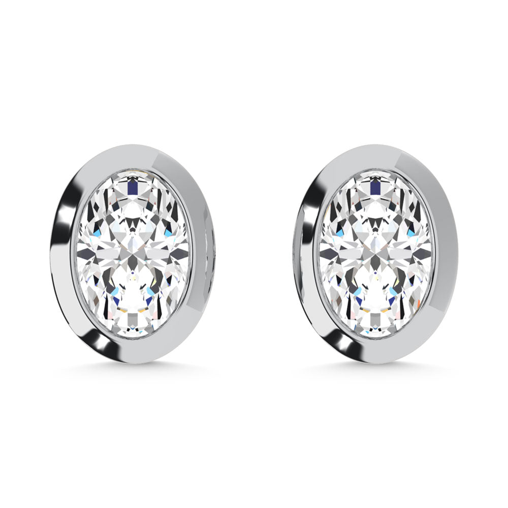 Handcrafted 10k White Gold stud earrings, showcasing 0.21 CTW lab grown diamond, in a oval cut, close-up detail shot.