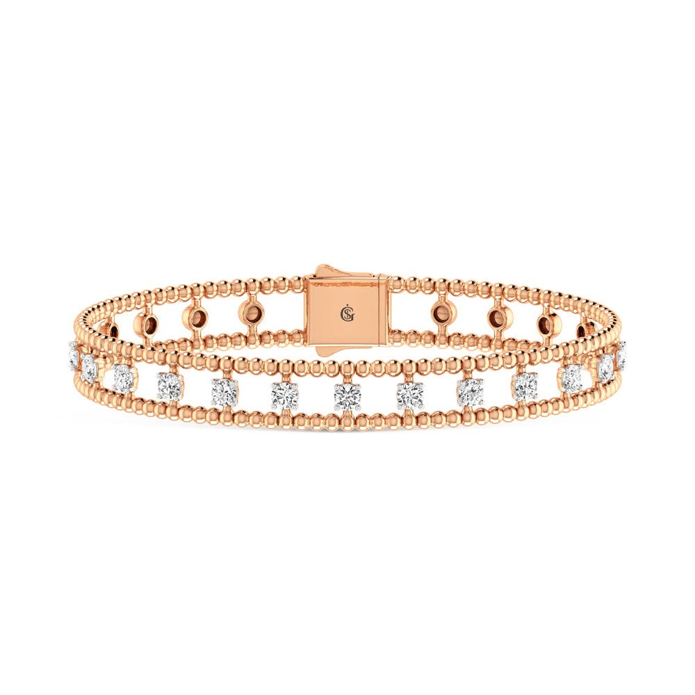 Handcrafted 14k Rose Gold diamond bangle, showcasing 1.3 CTW lab grown diamond, in a round cut, close-up detail shot | Picasso Gold & Diamond Jewelry.