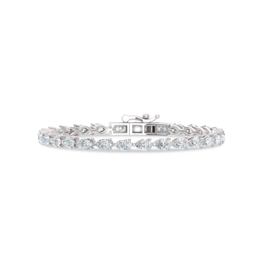 Handcrafted 14k White Gold bracelet, set with 10 CTW lab grown diamond, with pear-cut stones, close-up detail shot.