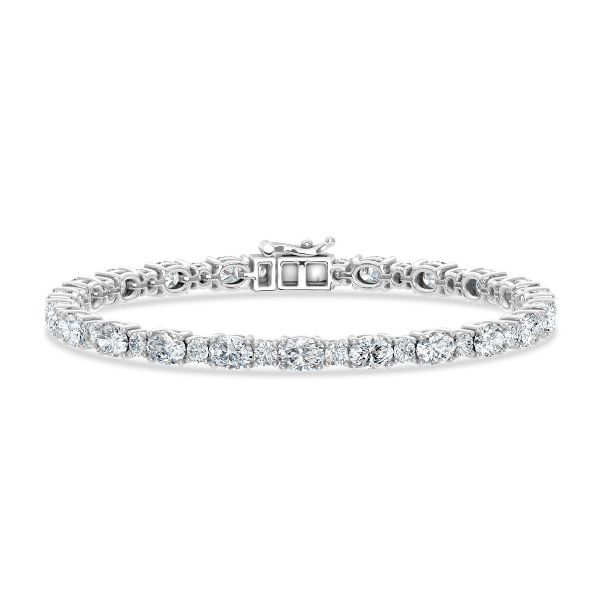 Classic 14k White Gold bracelet, showcasing 6.75 CTW lab grown diamond, with oval / round-cut stones, close-up detail shot.