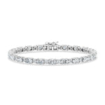 Classic 14k White Gold bracelet, showcasing 6.75 CTW lab grown diamond, with oval / round-cut stones, close-up detail shot.