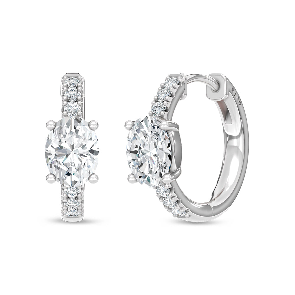14K White Gold hoop earrings, set with 1 CTW lab grown diamond, in a oval / round cut, close-up detail shot.