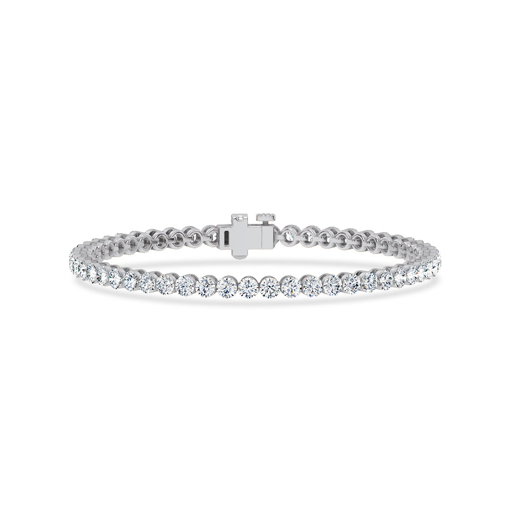 Classic 14k White Gold tennis bracelet, set with 8.1 CTW lab grown diamond, in a round cut, close-up detail shot | Picasso Gold & Diamond Jewelry.