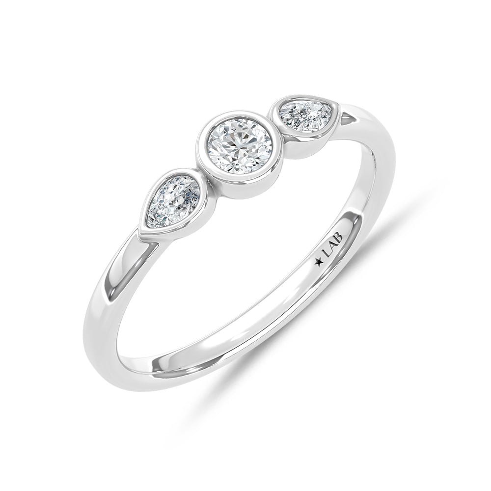 14K White Gold lab-grown diamond 1/4 ct.tw. three-stone ring, side profile view.