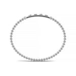 Handcrafted 14k White Gold diamond bangle, set with 1.05 CTW lab grown diamond, worn lifestyle shot, Chicago fine jewelry, nationwide shipping.
