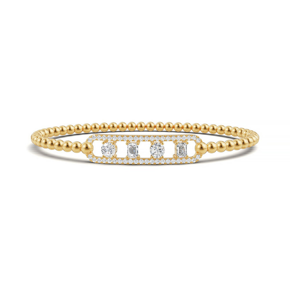 Handcrafted 14k Yellow Gold diamond bangle, showcasing 1.05 CTW lab grown diamond, in a round cut, close-up detail shot.