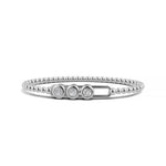14k White Gold diamond bangle, featuring 0.7 CTW lab grown diamond, in a round cut, close-up detail shot.