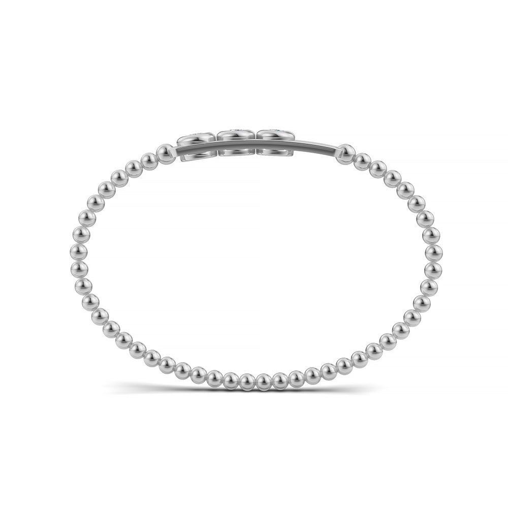 14k White Gold diamond bangle, featuring 0.7 CTW lab grown diamond, worn lifestyle shot, handcrafted, ships free nationwide.