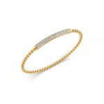 Classic 14k Yellow Gold diamond bangle, showcasing 1.33 CTW lab grown diamond, side profile view.