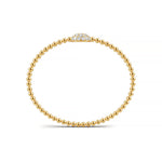 Handcrafted 14k Yellow Gold diamond bangle, set with 1.32 CTW lab grown diamond, worn lifestyle shot.