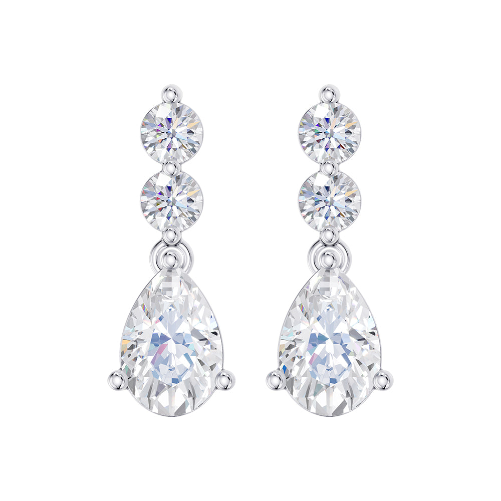 Earrings in 14k White Gold, set with 2.03 CTW lab diamond, in a pear / round cut, close-up detail shot | Picasso Gold & Diamond Jewelry.