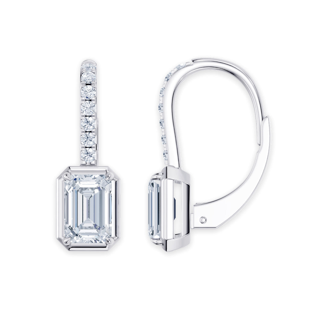 Handcrafted 14k White Gold dangle earrings, showcasing 8 CT lab-grown diamond, with emerald-cut stones, close-up detail shot.