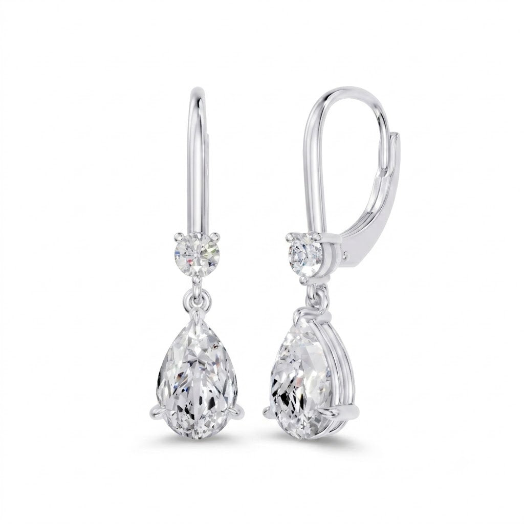 Classic 14k White Gold earrings, showcasing 3 CT lab-grown diamond, in a pear cut, close-up detail shot.