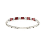 Classic 14k White Gold diamond bangle, featuring 6.5 CTW lab diamond / lab ruby, with round / elongated cushion-cut stones, close-up detail shot.