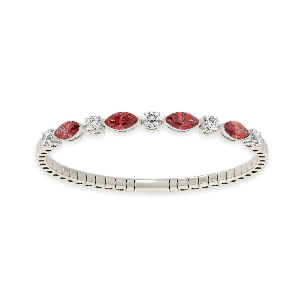 Diamond bangle in 14k White Gold, showcasing 6.5 CTW lab diamond / lab ruby, in a round / marquise cut, close-up detail shot.
