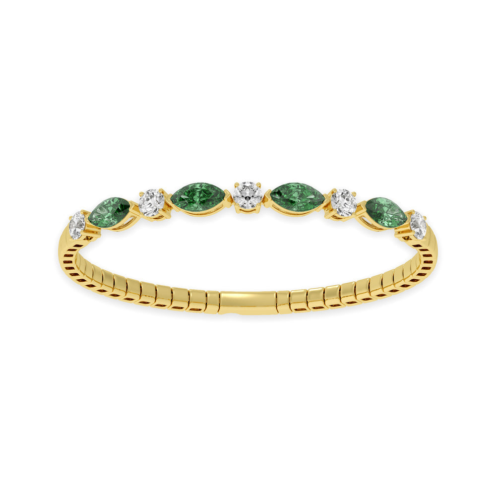 Elegant 14k Yellow Gold diamond bangle, featuring 6.5 CTW lab diamond / lab emerald, with round / marquise-cut stones, close-up detail shot.