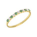 Diamond bangle in 14k Yellow Gold, showcasing 11 CTW lab diamond / lab emerald, worn lifestyle shot.