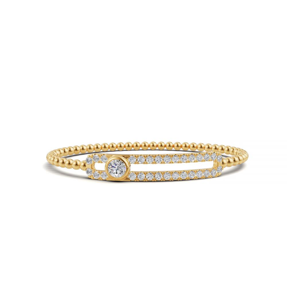 14k Yellow Gold diamond bangle, set with 2 CTW lab grown diamond, in a round cut, close-up detail shot | Picasso Gold & Diamond Jewelry.